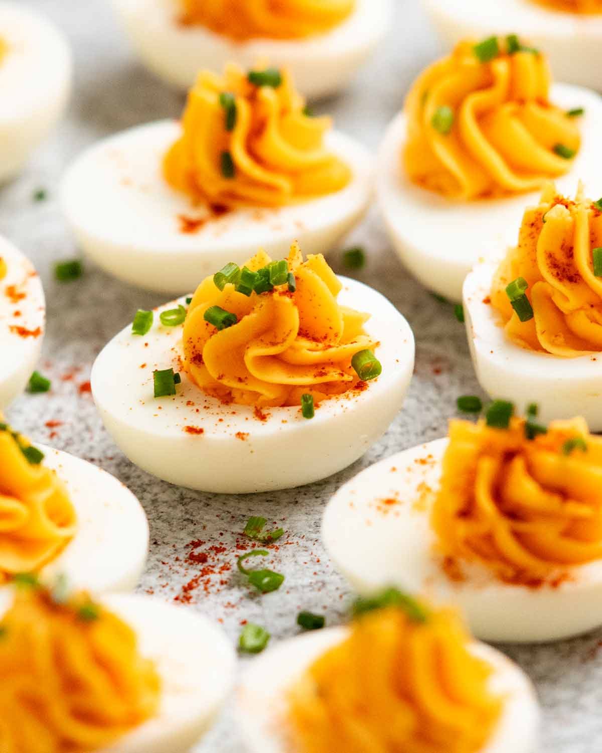 Garnished devilled eggs ready to serve