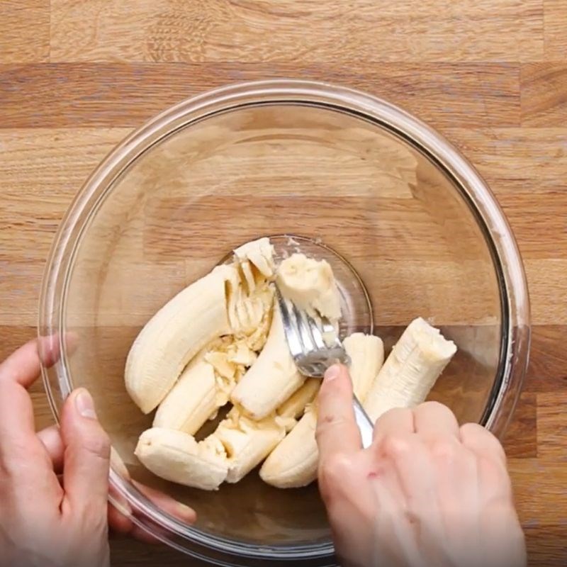 Mashing bananas for chocolate bread